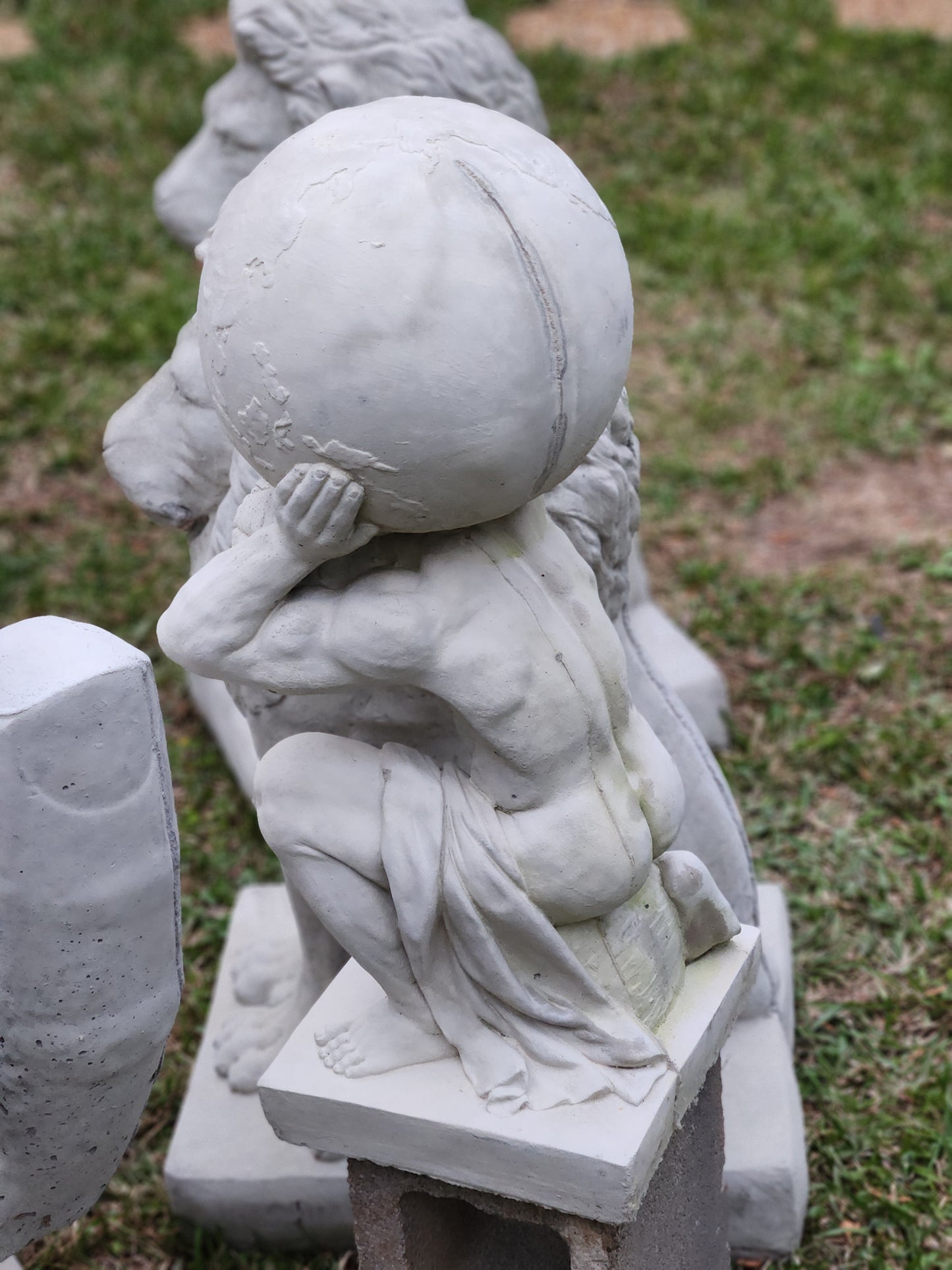 Atlas Concrete Statue