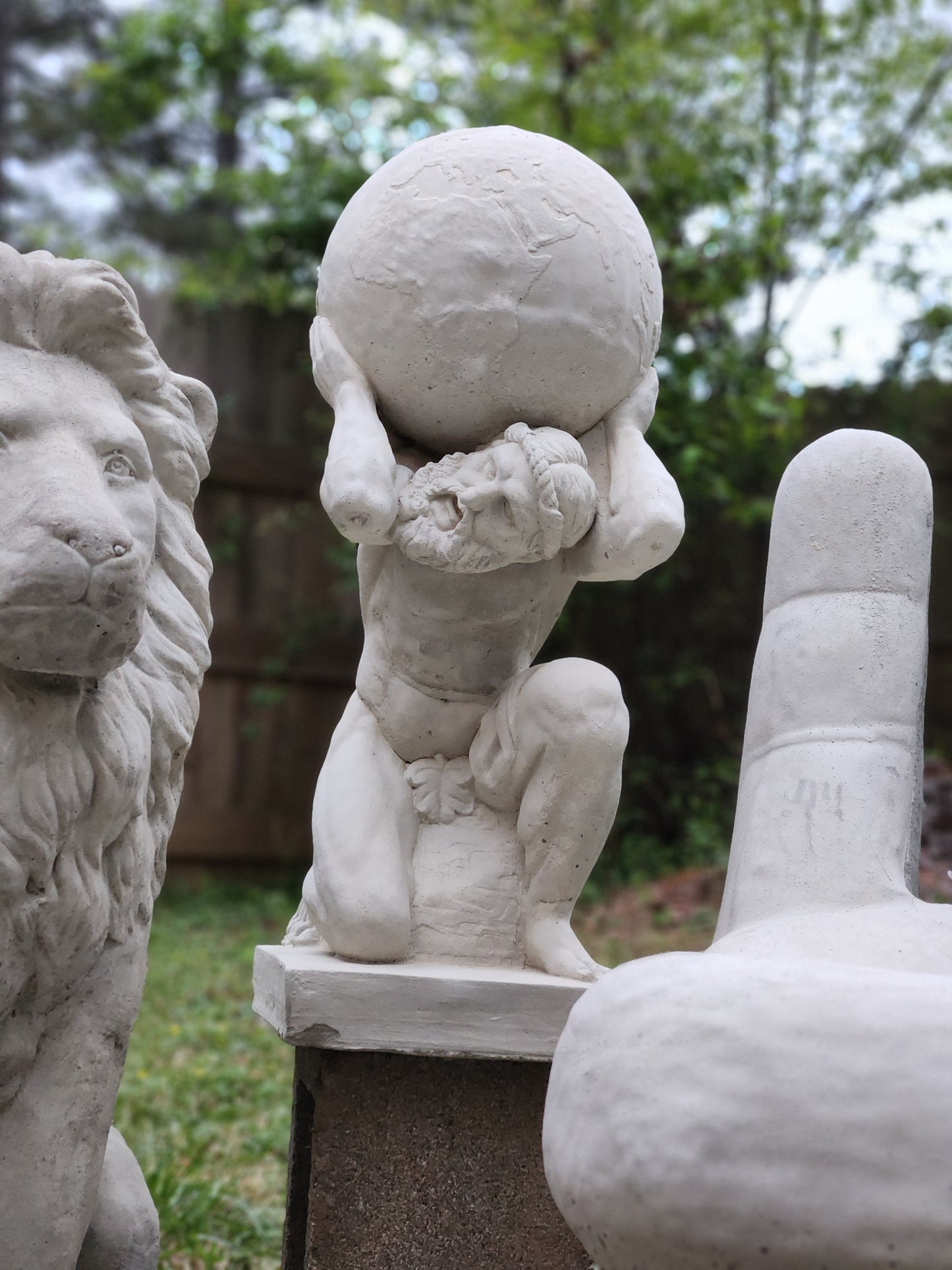 Atlas Concrete Statue